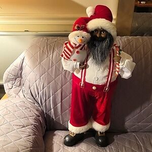 Santa with snowman and candy cane